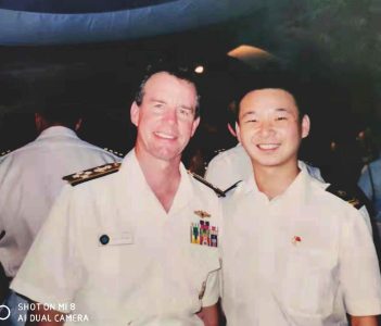 P6: Photo Show Admiral Thomas B. Fargo, Commander of the United States Pacific Command standing next to food art sculpted by Truman Du in Hawaii in March 1997.